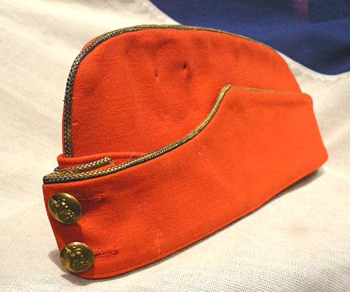 An Edwardian Colonel's Scarlet Cloth Sidecap, of 15th The Kings Hussars. With Gold Bullion Trim.