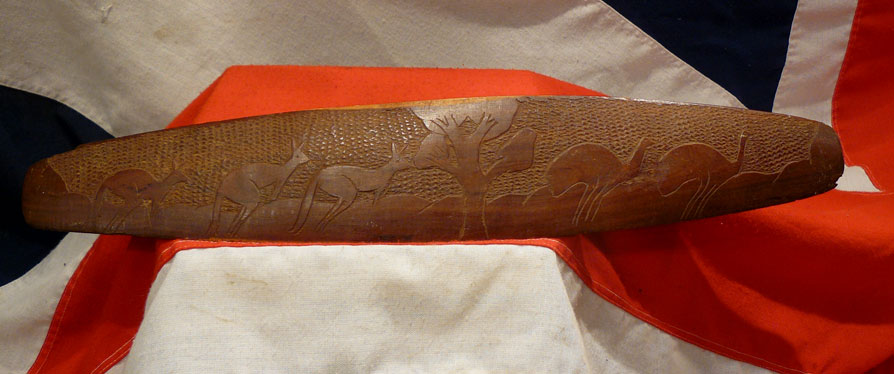 A Vintage Carved Aboriginal Culture Wunda Parrying Shield With a Chip Carving Design of Kangaroo and Emu.