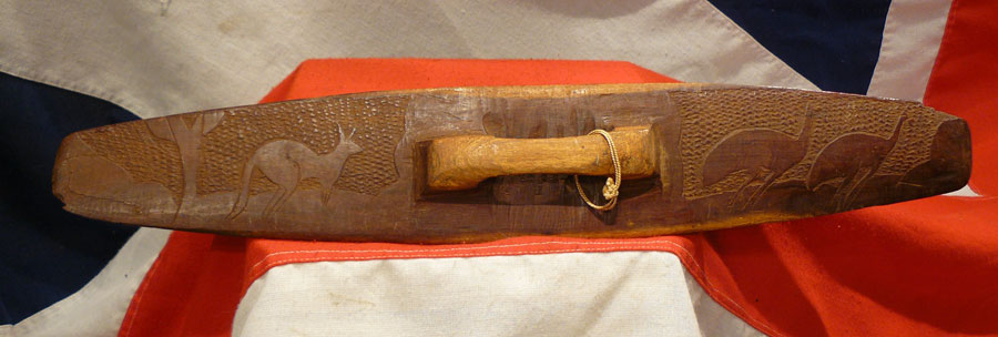 A Vintage Carved Aboriginal Culture Wunda Parrying Shield With a Chip Carving Design of Kangaroo and Emu.