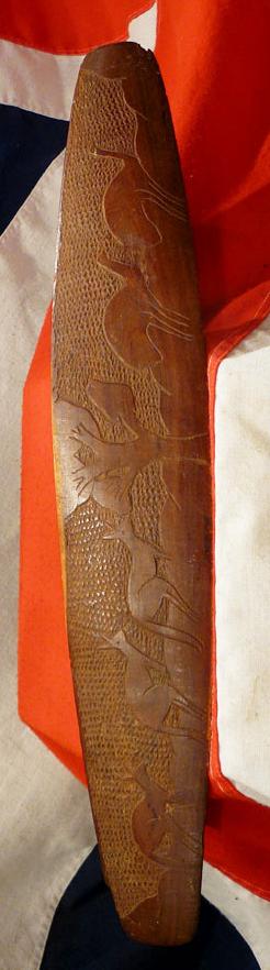 A Vintage Carved Aboriginal Culture Wunda Parrying Shield With a Chip Carving Design of Kangaroo and Emu.