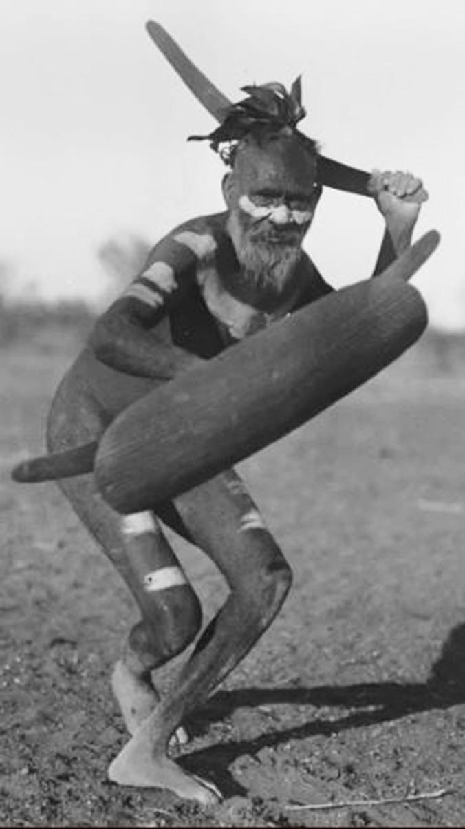 A Vintage Carved Aboriginal Culture Wunda Parrying Shield With a Chip Carving Design of Kangaroo and Emu.