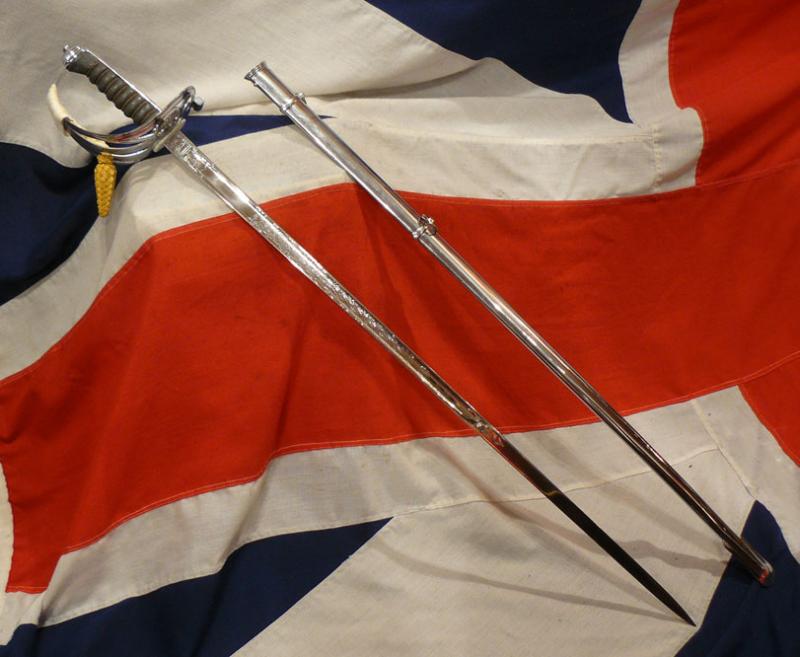 A Grenadier Guards Officer's Sword From The Lanes Armoury Sold, and Raised £2,465 For The Queen Elizabeth Hospital Birmingham Charity, Photographed With H.M. King Charles formerly HRH P.O.W