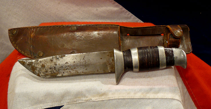 A WW2 'Bowie' Type Fighting Knife With Pressed Leather Grip