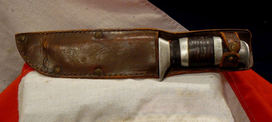 A WW2 'Bowie' Type Fighting Knife With Pressed Leather Grip
