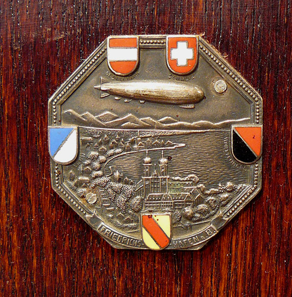 An Unusual Piece of Original, Airship Aeronautica, 1929 Zeppelin Display Stand, In Oak With Zeppelin Badge And Carved Airship