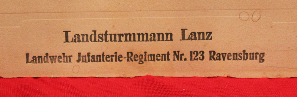 An Original Imperial German WW1 Zeppelin Warfare Interest, Bespoke. And Coloured Print of a German Infantryman, Landsturmann Lantz. From the Wolf Photographic Studio of Ulm.