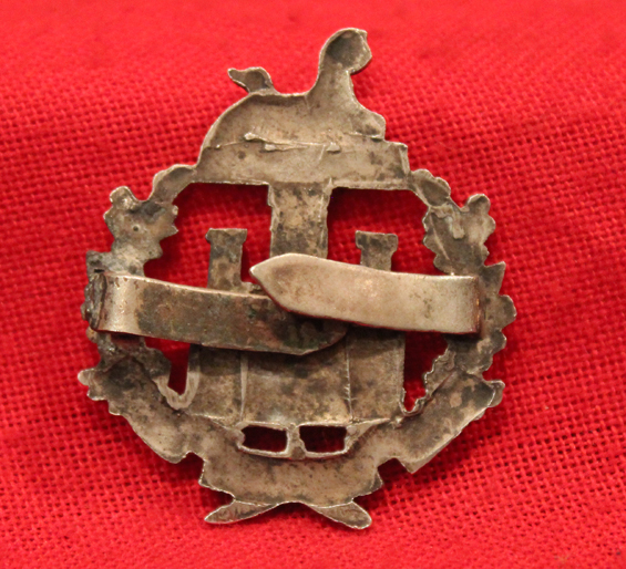 A 1930's Essex Regt. Silver Officers Cap Badge