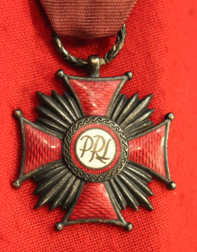 A Polish Republic Order Of Merit Medal with Miniature in Original Box