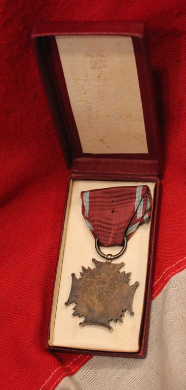 A Polish Republic Order Of Merit Medal with Miniature in Original Box