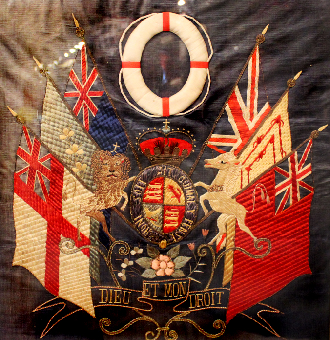 A Singularly Beautiful & Rare Victorian Folk Art Silk 'Royal' Maritime Embroidery Woolwork, A ‘Jack Tar’ Sailor’s Woolwork or ‘Woolie’. The White Ensign, Red Ensign, Blue Ensign, Union Flag, Scottish Standard, Shamrock Flag