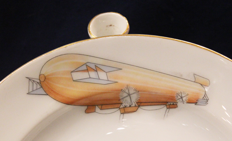 A Very Good German 1900's & WW1 Porcelain Zeppelin Plate Warmer