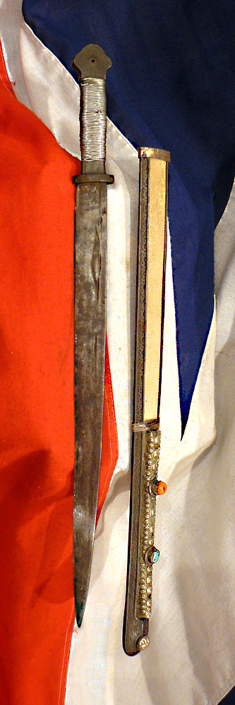 Beautiful 17th to 18th Century Chinese Qing Dynasty Period Sword Of The Era Of Emperor Kangxi, With a Silver Wire Bound Hilt, and a Silver, Giant Rayskin, Coral & Turquoise Gem Set Panelled Scabbard, Typical of Eastern Tibet