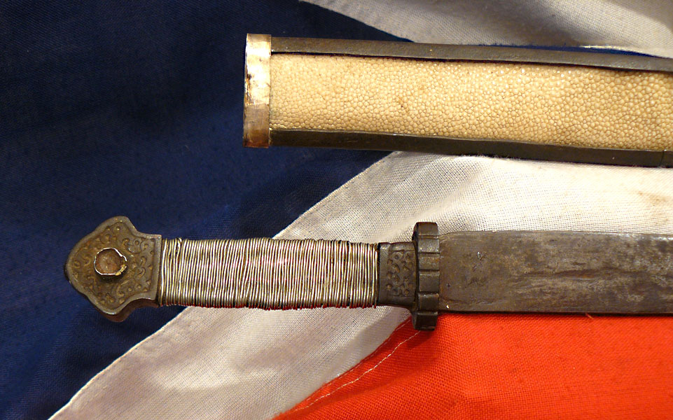 Beautiful 17th to 18th Century Chinese Qing Dynasty Period Sword Of The Era Of Emperor Kangxi, With a Silver Wire Bound Hilt, and a Silver, Giant Rayskin, Coral & Turquoise Gem Set Panelled Scabbard, Typical of Eastern Tibet