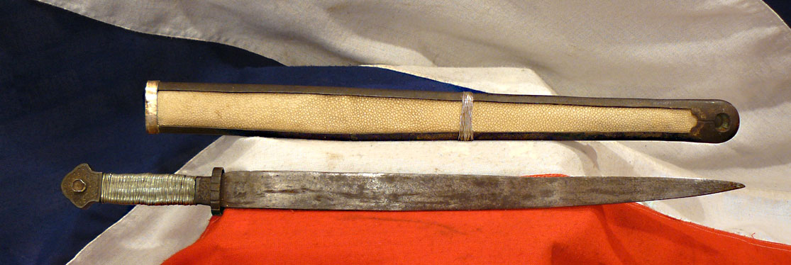 Beautiful 17th to 18th Century Chinese Qing Dynasty Period Sword Of The Era Of Emperor Kangxi, With a Silver Wire Bound Hilt, and a Silver, Giant Rayskin, Coral & Turquoise Gem Set Panelled Scabbard, Typical of Eastern Tibet