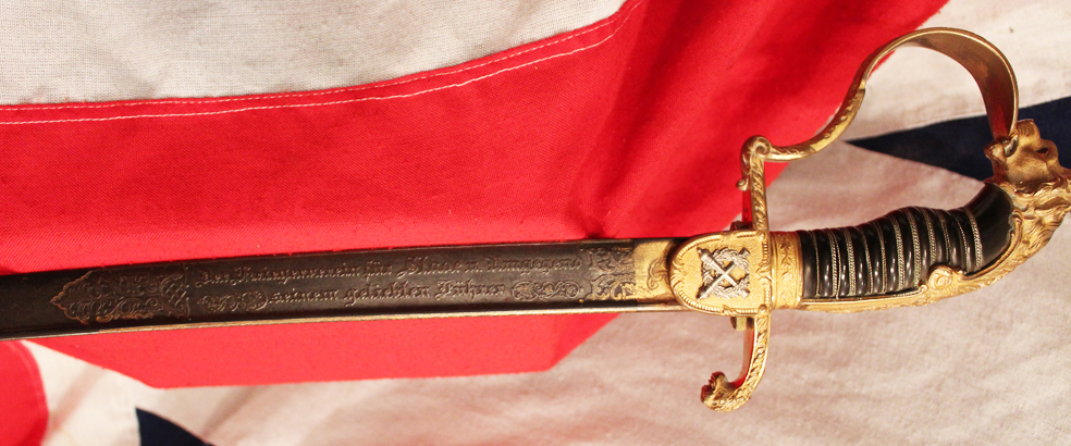 An Original, Incredibly Rare 'Damascus' Presentation Sword, Presented to the German Fuhrer of 1898, An Imperial German, Damascus Steel, Blue & Gilt, Presentation Fuhrer's Sword. Set With Genuine Rubies and Silver Crossed Cannon