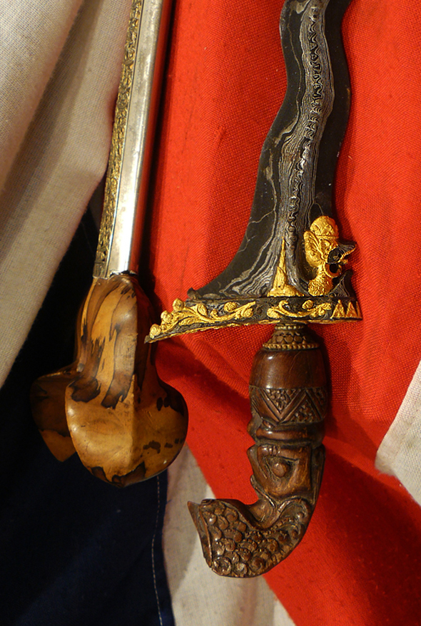 A Fabulous Javanese Kris With Pure Gold Snake God Symbol Onlaid on to The Fabulous Pamor Serpentine Blade