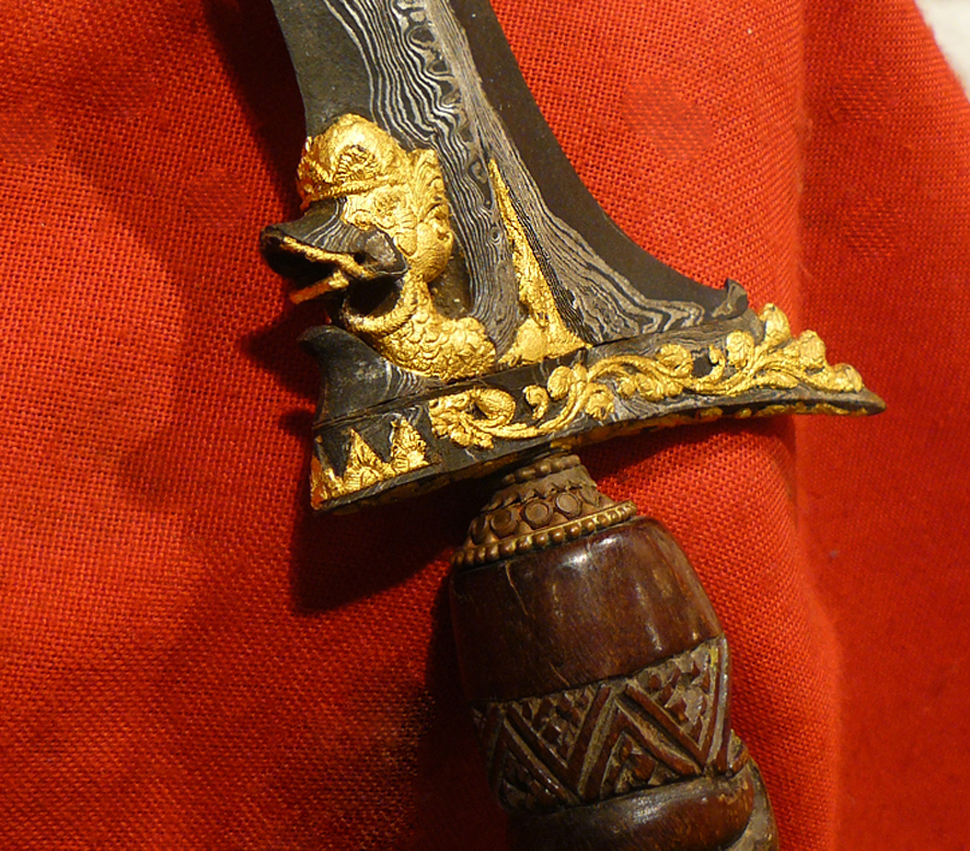 A Fabulous Javanese Kris With Pure Gold Snake God Symbol Onlaid on to The Fabulous Pamor Serpentine Blade