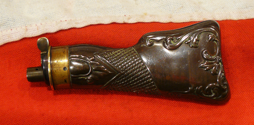 A Wonderful and Highly Desirable Original Antique Pistol Flask Shaped in the Form of a Rifle Butt