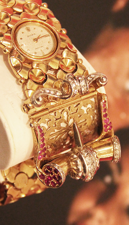 The Spectacular, Elizabeth Taylor, 'Million Dollar' Gold, Diamond And Ruby Rolex 'Mystery' Watch, With a Diamond & Ruby Bracelet. Described As, Probably, The Most Spectacular, Beautiful and Unique Rolex Watch in the World