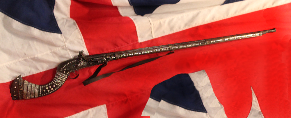 An 18th Century Highly Decorated North West Frontier Jazail, With The Iconic Recurved Butt Stock & Elaborate Inlaid Decor