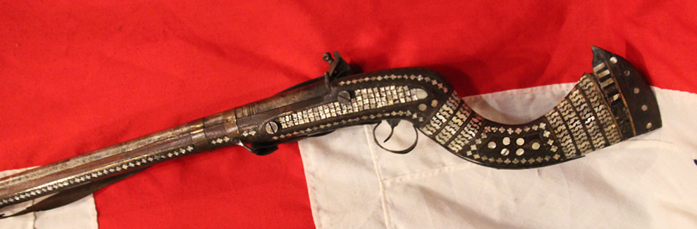 An 18th Century Highly Decorated North West Frontier Jazail, With The Iconic Recurved Butt Stock & Elaborate Inlaid Decor