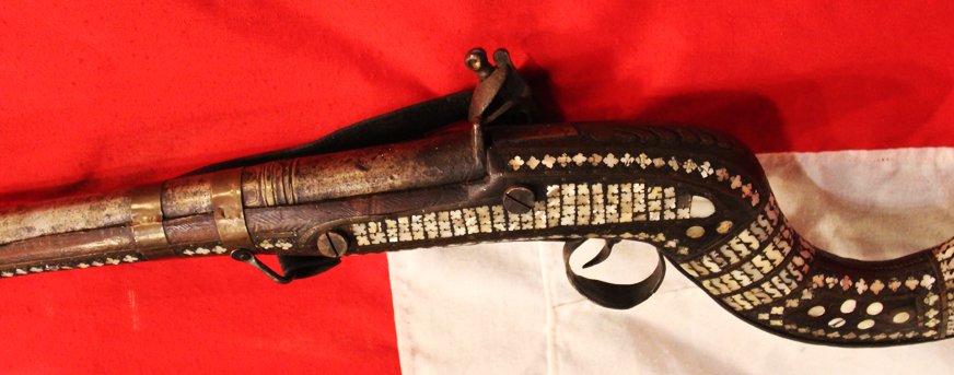 An 18th Century Highly Decorated North West Frontier Jazail, With The Iconic Recurved Butt Stock & Elaborate Inlaid Decor