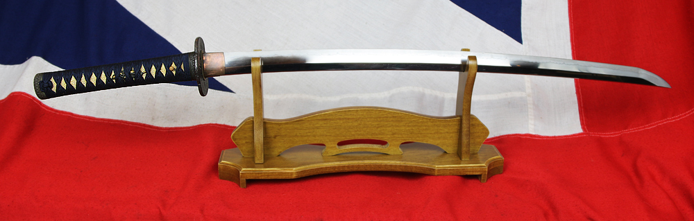 A Very Good & Beautiful Shinto Long Katana Signed Chikanobu. Very Good, Unique Matsushiro Sinano Sinchu & Silver Line Koshirae. Gold and Shakudo Dragon Clutching The Pearl Of Wisdom Menuki. Circa 1680.