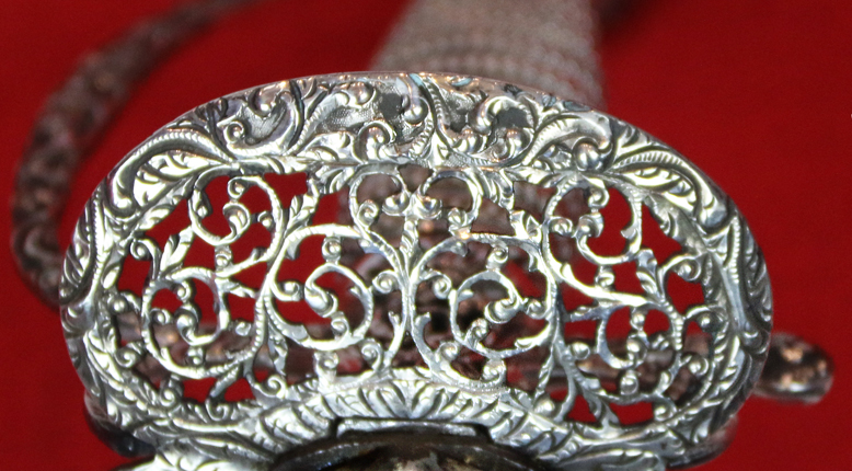 A Magnificent 18th Century Silver Hilted Small Sword with Colichmarde Blade. This Is One Of The Most Beautiful We Have Seen in Several years