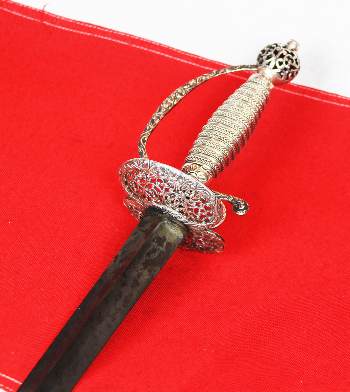 A Magnificent 18th Century Silver Hilted Small Sword with Colichmarde Blade. This Is One Of The Most Beautiful We Have Seen in Several years