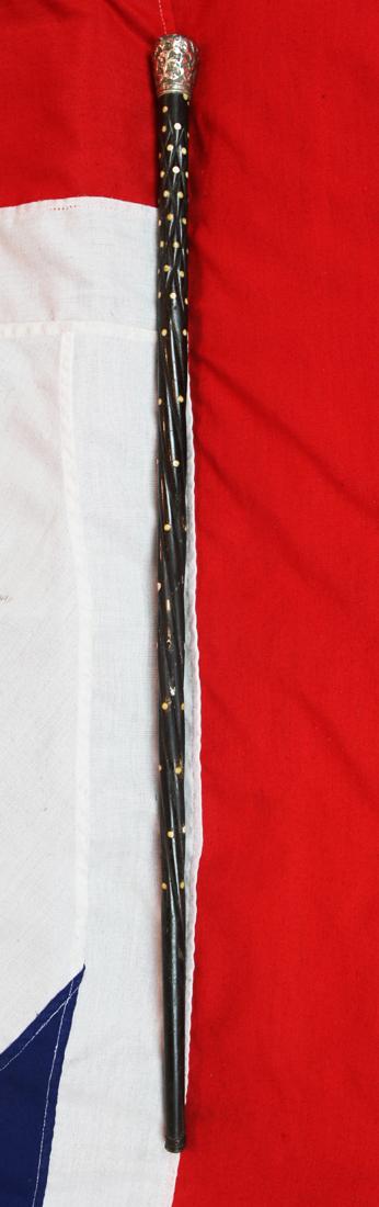 A Most Interesting & Beautiful Quality Victorian Walking Cane. With a Florid Repousse Silver Top, Carved Spiral Haft With Carved Bullet Inlays