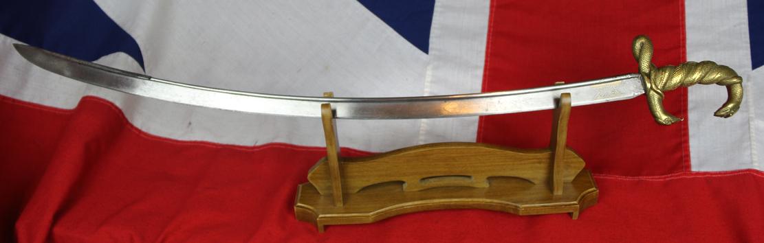 A Superb Late 18th Century, Napoleonic Wars British Officer's Sabre With a French 'Trophy' Blade, With An Ancient Egyptian Goddess Wadget Entwined Serpent British Hilt