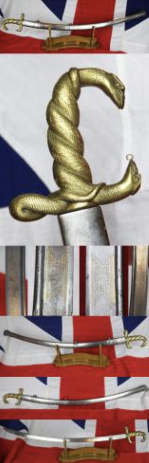 A Superb Late 18th Century, Napoleonic Wars British Officer's Sabre With a French 'Trophy' Blade, With An Ancient Egyptian Goddess Wadget Entwined Serpent British Hilt