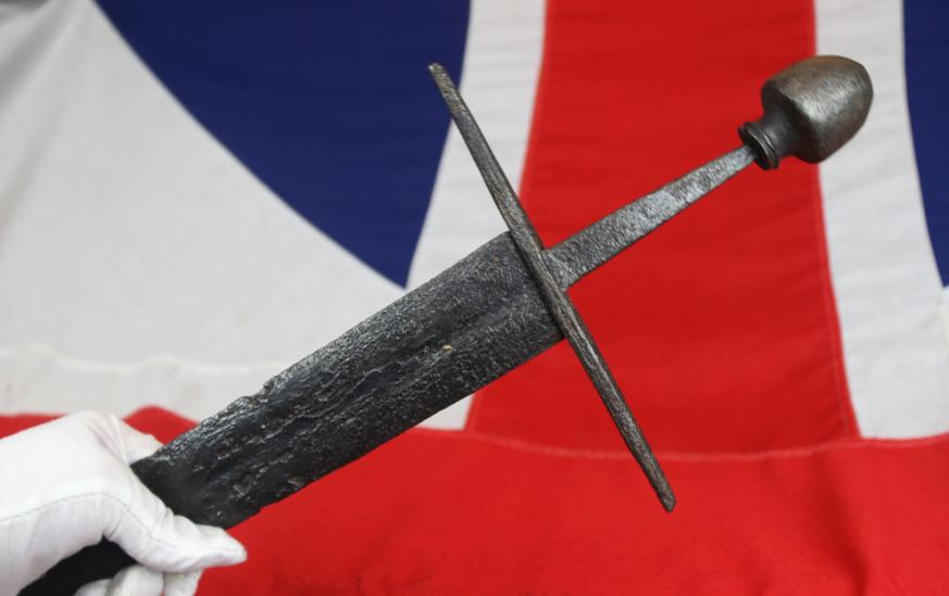 A Superb Original 12th Century Crusader Knights Templar Medieval Knight's Dagger, A Shortened Knightly Sword, with Crucifix Hilt. The Blade Bears The Remains of a Templar Cross, Inlaid, in Gold Alloy Latten, Upon One Blade Face Below The Hilt