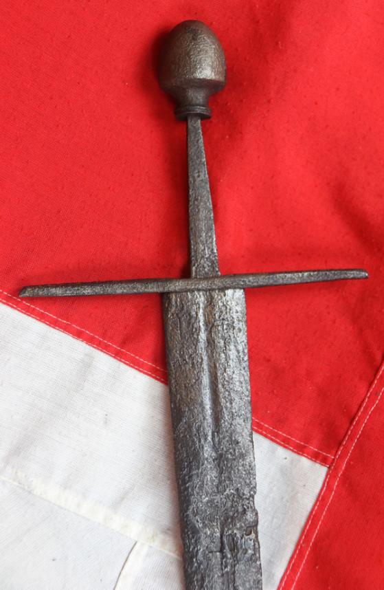 A Superb Original 12th Century Crusader Knights Templar Medieval Knight's Dagger, A Shortened Knightly Sword, with Crucifix Hilt. The Blade Bears The Remains of a Templar Cross, Inlaid, in Gold Alloy Latten, Upon One Blade Face Below The Hilt