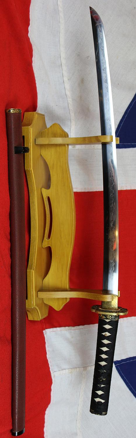 A Fabulous Museum Grade Samurai Daimyo's Art-Sword. From The Koto Era. A Samurai Wakizashi Sword By Master Tadamitsu With Rare Gaku-mei Nakago. Blade, Circa 1440-1460. Mino Goto Koshirae, With Deep Red Ishime Lacquer Saya & Black Silk Binding