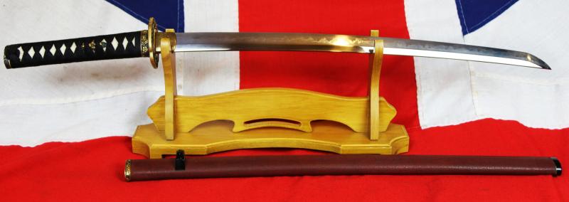 A Fabulous Museum Grade Samurai Daimyo's Art-Sword. From The Koto Era. A Samurai Wakizashi Sword By Master Tadamitsu With Rare Gaku-mei Nakago. Blade, Circa 1440-1460. Mino Goto Koshirae, With Deep Red Ishime Lacquer Saya & Black Silk Binding