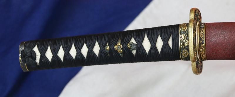 A Fabulous Museum Grade Samurai Daimyo's Art-Sword. From The Koto Era. A Samurai Wakizashi Sword By Master Tadamitsu With Rare Gaku-mei Nakago. Blade, Circa 1440-1460. Mino Goto Koshirae, With Deep Red Ishime Lacquer Saya & Black Silk Binding