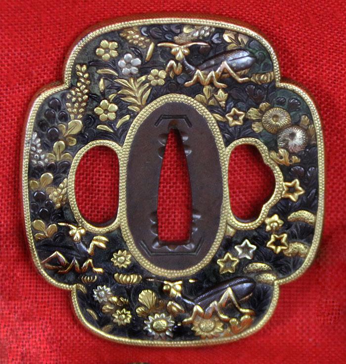 A Fabulous Museum Grade Samurai Daimyo's Art-Sword. From The Koto Era. A Samurai Wakizashi Sword By Master Tadamitsu With Rare Gaku-mei Nakago. Blade, Circa 1440-1460. Mino Goto Koshirae, With Deep Red Ishime Lacquer Saya & Black Silk Binding