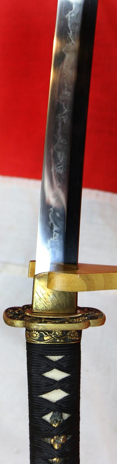 A Fabulous Museum Grade Samurai Daimyo's Art-Sword. From The Koto Era. A Samurai Wakizashi Sword By Master Tadamitsu With Rare Gaku-mei Nakago. Blade, Circa 1440-1460. Mino Goto Koshirae, With Deep Red Ishime Lacquer Saya & Black Silk Binding