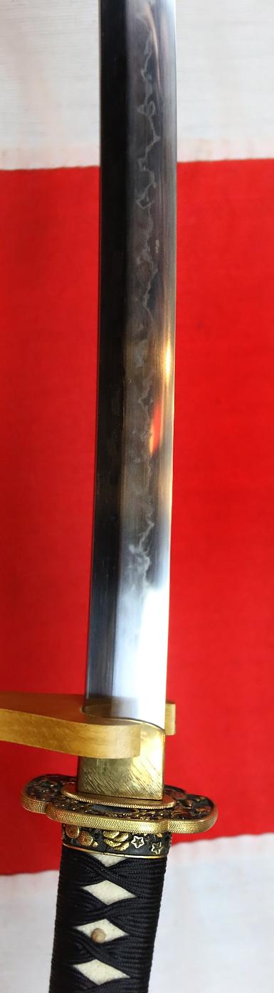 A Fabulous Museum Grade Samurai Daimyo's Art-Sword. From The Koto Era. A Samurai Wakizashi Sword By Master Tadamitsu With Rare Gaku-mei Nakago. Blade, Circa 1440-1460. Mino Goto Koshirae, With Deep Red Ishime Lacquer Saya & Black Silk Binding