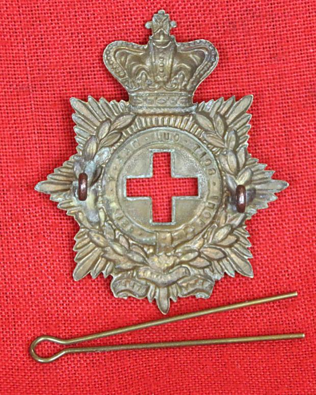 A Really Most Rare Original Zulu War Veteran's Souvenir, A Victorian Army Hospital Corps Pill Box Helmet Badge. The Surgeon Major, and 1 Officer and 10 Army Hospital Corps Other Ranks Were Slaughtered at Isandhwana 1879