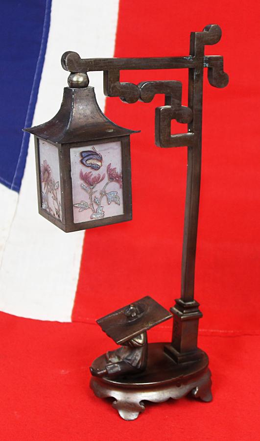 A Most Incredible and Intriguing European Art Deco Bronze Table Lamp, Decorated With the Subject of a Prisoner in an Ancient Chinese 'Cangue' Torture Device Beneath a Lamp