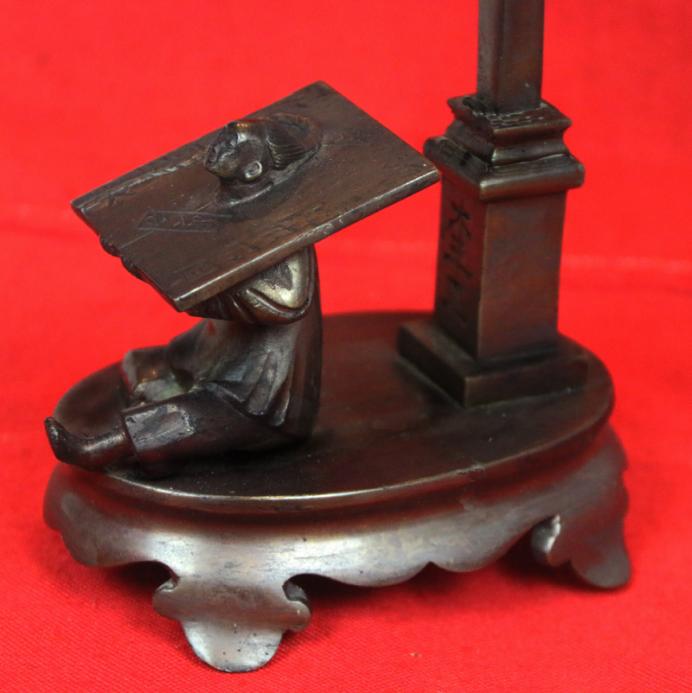 A Most Incredible and Intriguing European Art Deco Bronze Table Lamp, Decorated With the Subject of a Prisoner in an Ancient Chinese 'Cangue' Torture Device Beneath a Lamp