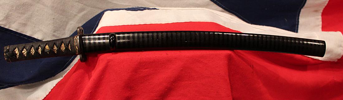 A Very Fine Indeed Samurai Shinto Wakizashi with Original Edo Goto School Dragon Fittings of Shakudo and Gold & An Edo Tettsu Krishitan {Christian} Tsuba