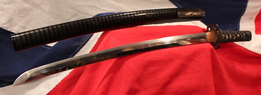 A Very Fine Indeed Samurai Shinto Wakizashi with Original Edo Goto School Dragon Fittings of Shakudo and Gold & An Edo Tettsu Krishitan {Christian} Tsuba