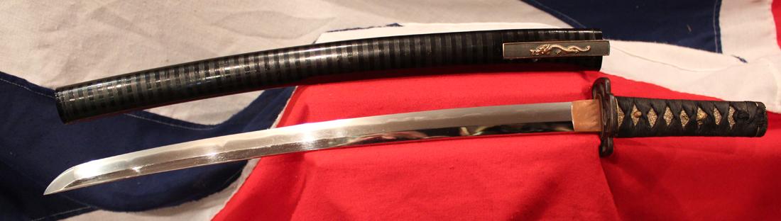 A Very Fine Indeed Samurai Shinto Wakizashi with Original Edo Goto School Dragon Fittings of Shakudo and Gold & An Edo Tettsu Krishitan {Christian} Tsuba