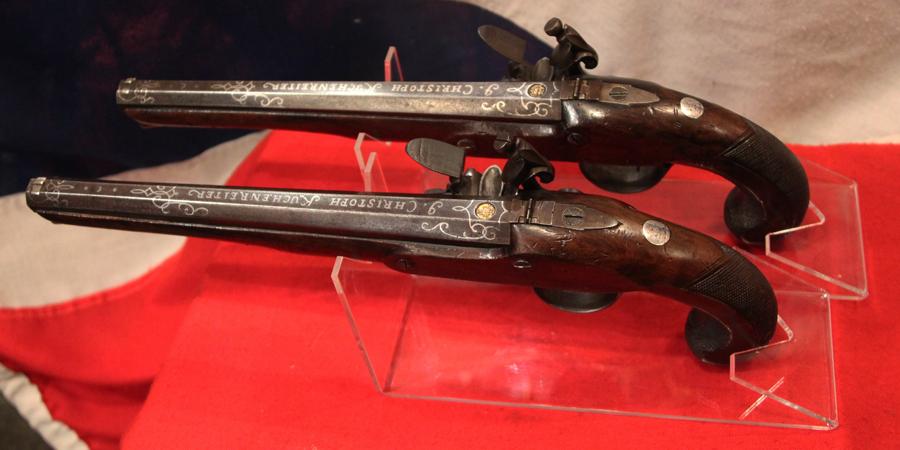 A Very Fine Pair of Cased 1800's English, Rifled Duelling Pistols, of Capt Robert Lloyd RN, Outstanding Hero of the War of 1812, Capturing 25 American Vessels, With Finest Silver Inlaid Barrels by Johann Christoph Kuchenreiter.