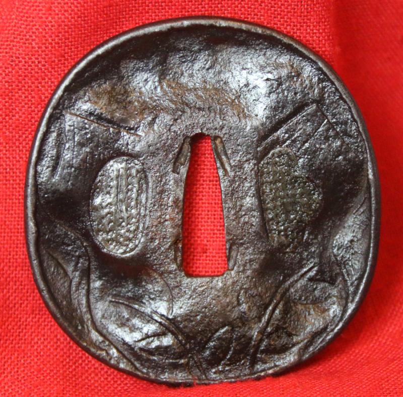 An Edo Period 1603 -1867, Katana Tsuba Tenbo Saotome Style, Hammered Iron With Formed Rim Mimi