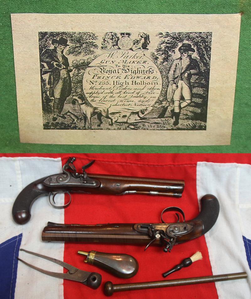 A Very Fine Condition Classic, Cased Pair of Late 18th to Early 19th Century Damascus Barrelled Duelling Pistols by Master Gunsmith William Parker of Holborn London. Original Oak Case with Tools and Accessories