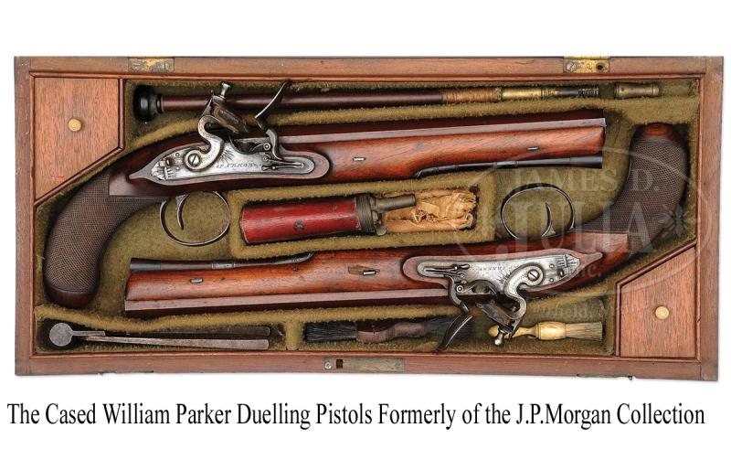 A Very Fine Condition Classic, Cased Pair of Late 18th to Early 19th Century Damascus Barrelled Duelling Pistols by Master Gunsmith William Parker of Holborn London. Original Oak Case with Tools and Accessories